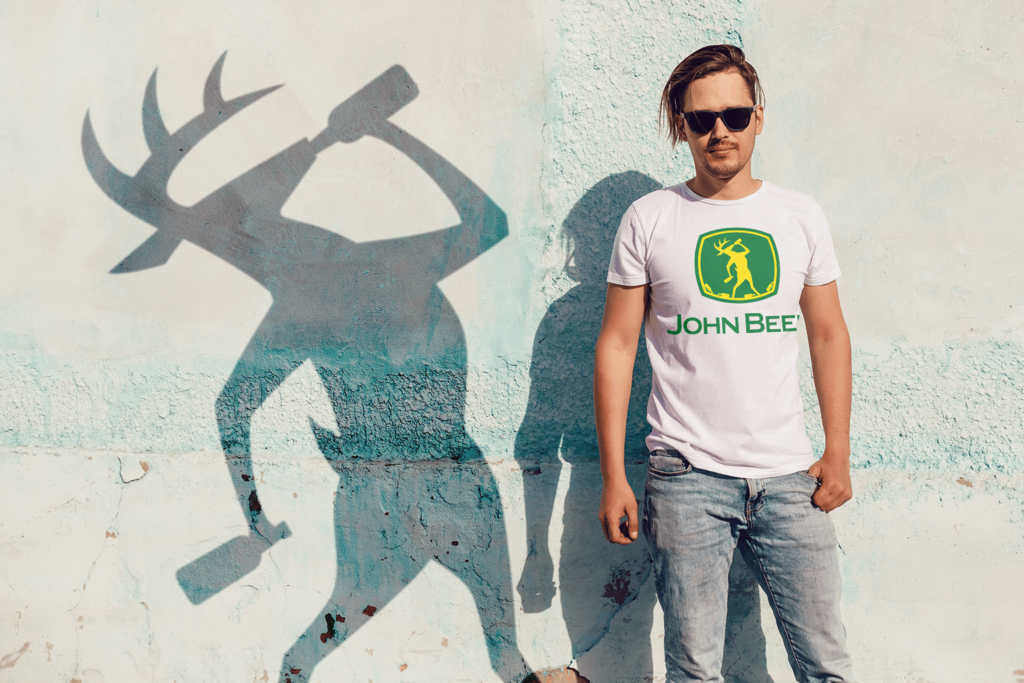 Young man wearing a white t-shirt with JOHN BEER design by © 2021 funnydrinking.com