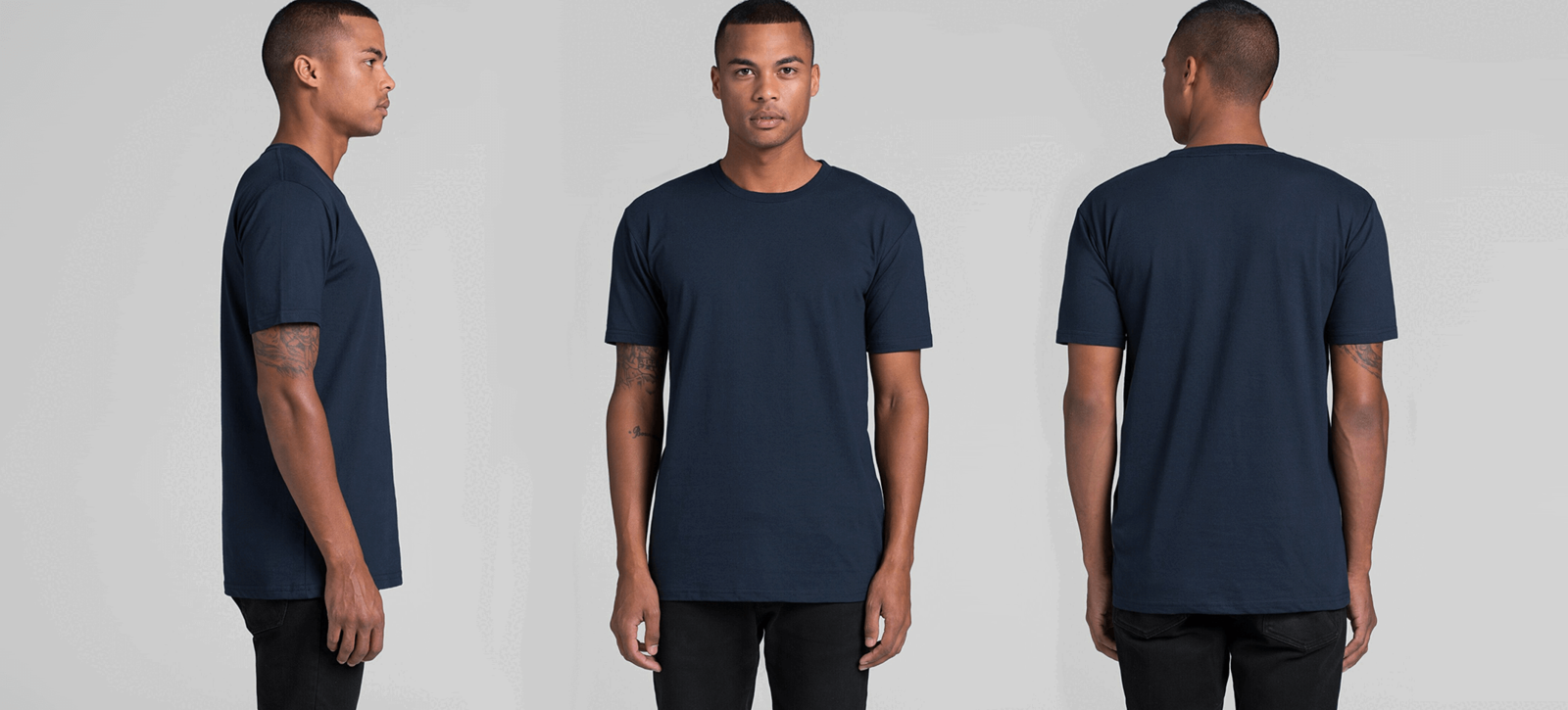 Young man with a 5001 staple tee by AS Colour in navy on © 2021 funnydrinking.com in mens clothing